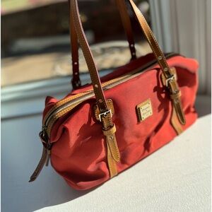 Dooney & Bourke nylon rectangular duffel satchel color is Burn orange